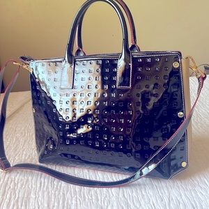 Arcadia Made in Italy handbag.Black patent leather with tan leather sides.
